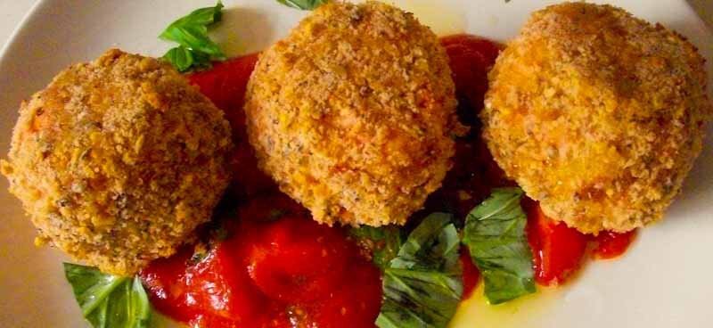 Arancini rice balls with tomato dip