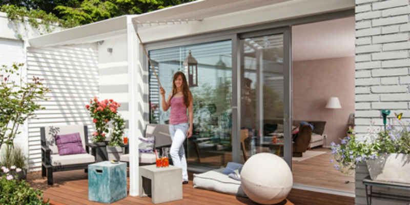 Build a wooden deck with louvered roof