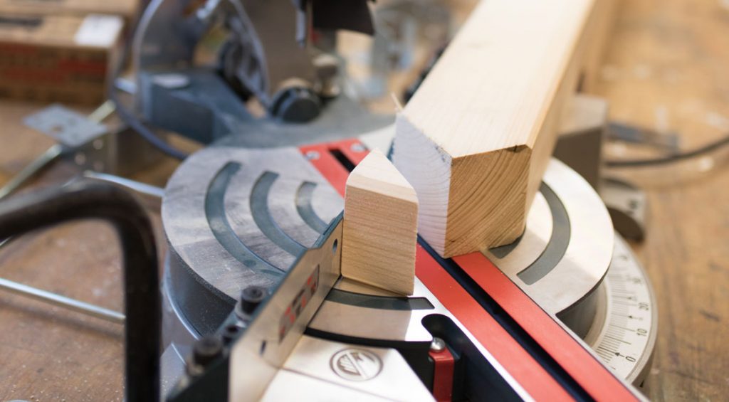 At the end of the beams, set a cut at a 45-degree angle on both sides