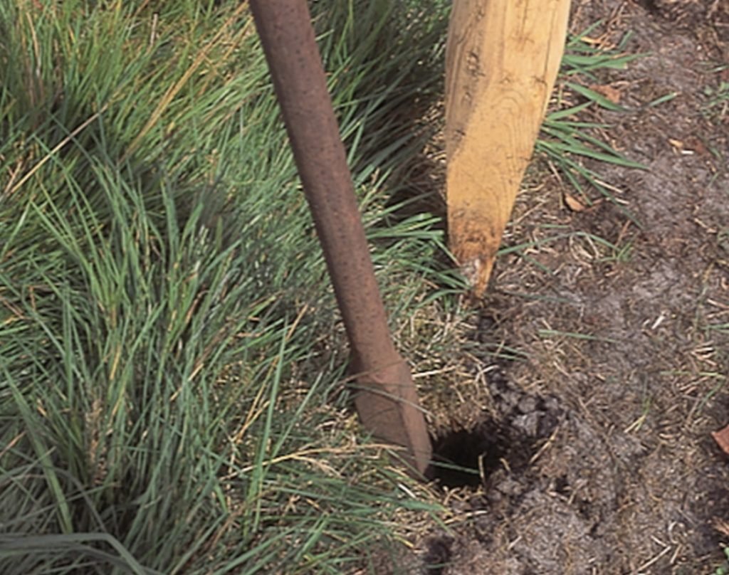 build a rustic stake garden fence