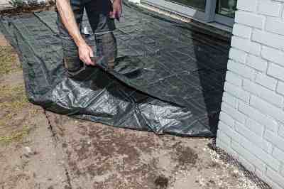 Build a wooden deck with louvered roof