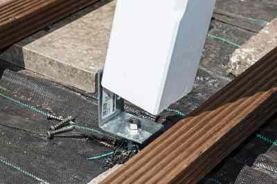 Build a wooden deck with louvered roof