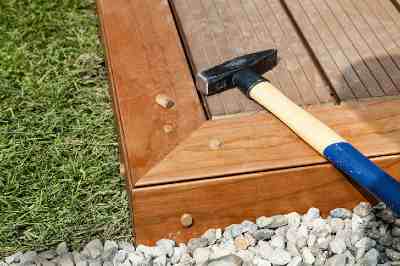 Build a wooden deck with louvered roof