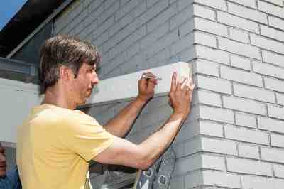 Build a wooden deck with louvered roof