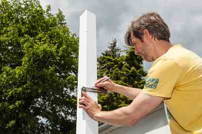 Build a wooden deck with louvered roof