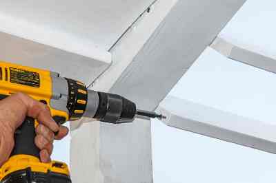 Build a wooden deck with louvered roof