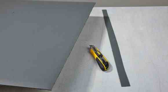 cover a desk with linoleum