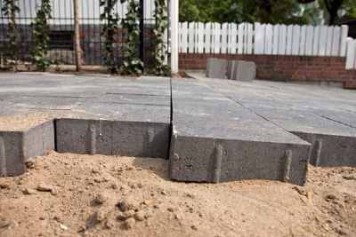 lay paving stones in a driveway