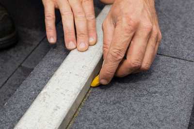 lay paving stones in a driveway