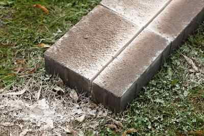 lay paving stones in a driveway