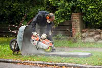 lay paving stones in a driveway