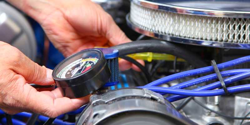 adjust a carburetor on a car